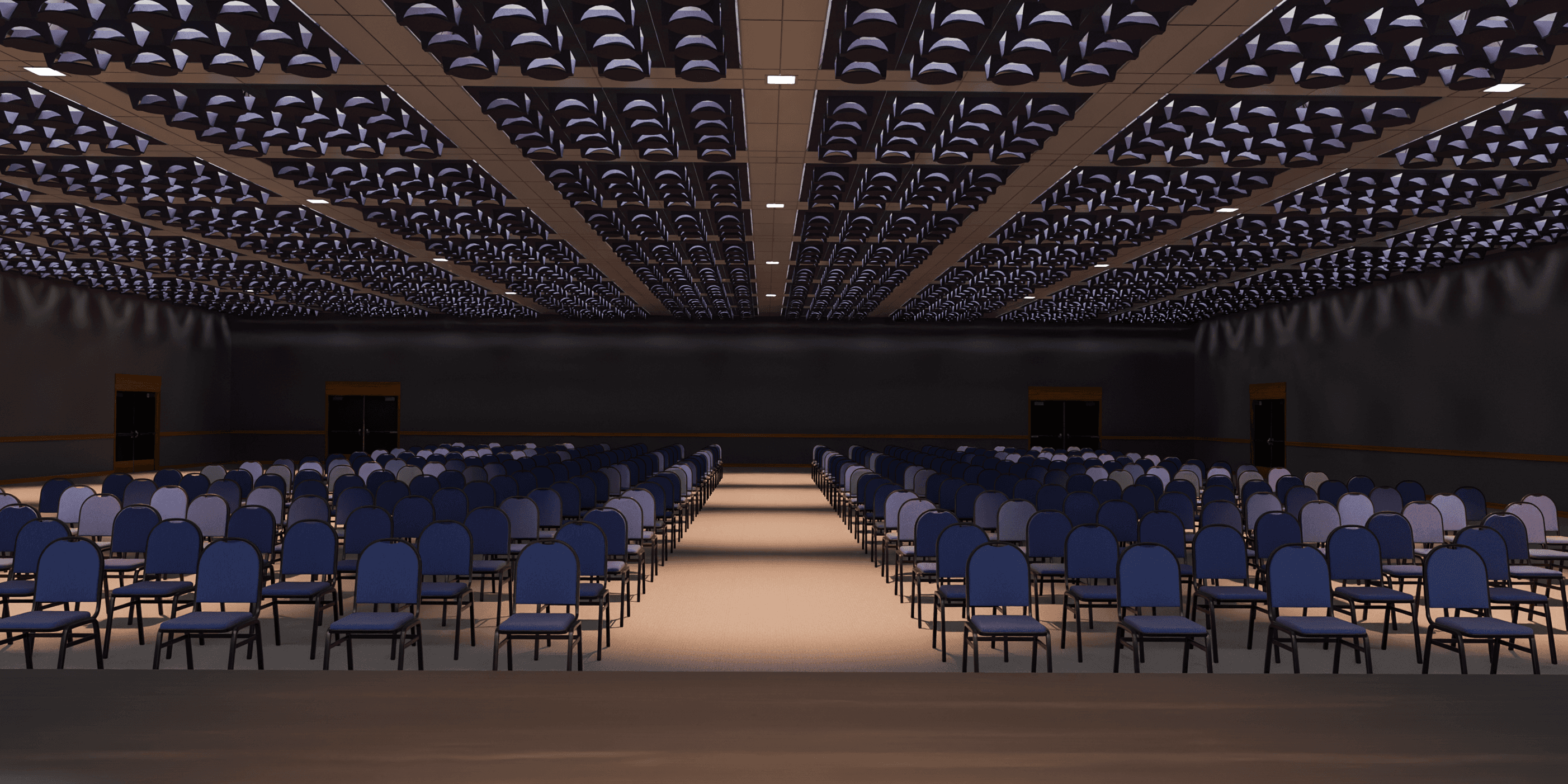 Modern auditorium with geometric acoustic ceiling panels and integrated lighting